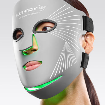 Model in multi-light mask with green LED light